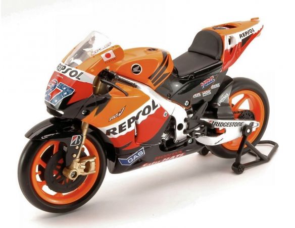 New Ray NY57403 HONDA C.STONER 2012 MOTO GP N.27 1:12 Modellino