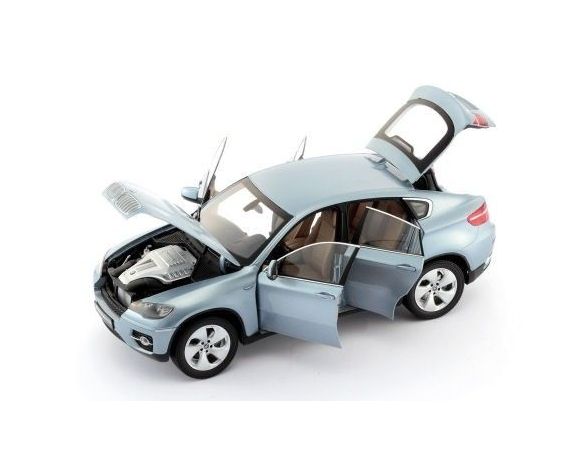 Kyosho KY8763BW BMW X6 ACTIVE HYBRID E71 2009 LIGHT BLUE MET.1:18 Modellino