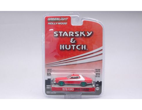 GREENLIGHT GREEN44855FGR FORD GRAN TORINO 1976 STARSKY & HUTCH DIRTY VERSION GREEN WHEELS 1:64 Modellino